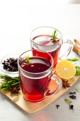 Herbal Tea, Red Tea in Glass Mugs, Autumn or Winter Drink
