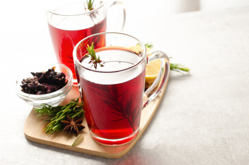 Herbal Tea, Red Tea in Glass Mugs, Autumn or Winter Drink