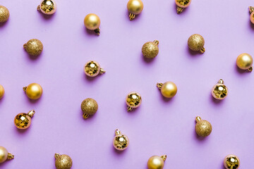 Christmas composition. a pattern of christmas balls on colored background. Flat lay, top view New year decor