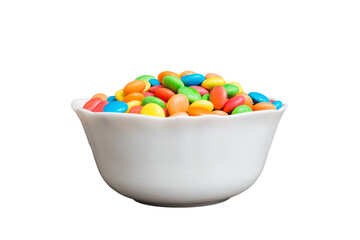 Multicolored candies in a bowl on a colored background. birthday and holiday concept. Top view with copy space