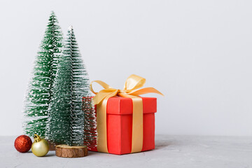 Christmas composition. craft Gift box, small tree, branches and craft DIY decorations on white background. New year concept. Christmas home decoration Flat lay, top view, copy space