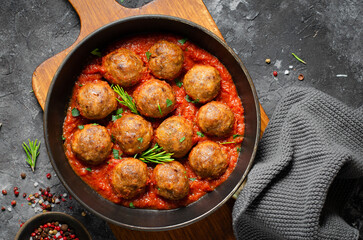 Meatballs in Tomato Sauce, Homemade Meatballs in a Pan on Dark Background