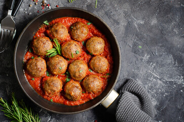 Meatballs in Tomato Sauce, Homemade Meatballs in a Pan on Dark Background
