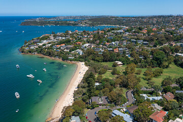 Fototapeta na wymiar Panoramic drone aerial view over Cobblers Bay and Chinamans Beach in Mosman, Northern Beaches Sydney
