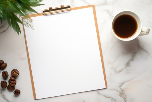 Cozy Winter Vibes: Empty Notepad, Coffee Mug, and Cones on a Marble Table