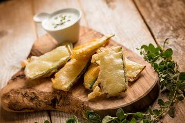 fried zucchinis with marjoram and yogurt sauce