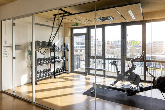 Gym with equipment in modern office