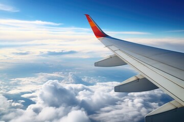Obraz premium an aircraft wing over a cloudy sky