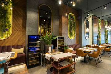 Interior of a luxury restaurant with flower decorated walls