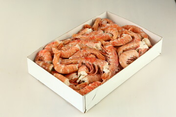 frosted king prawns closeup photo on white table background © ulianna19970