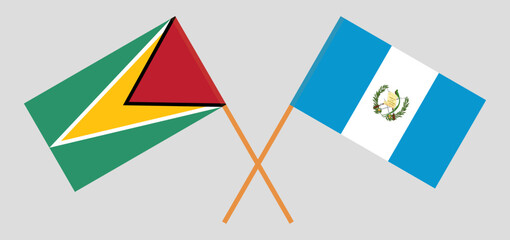 Crossed flags of Guyana and Guatemala. Official colors. Correct proportion