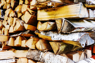 Firewood. Preparation of combustible materials for heating the house in the winter. Close-up. selective focus