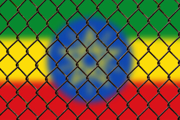 A steel mesh against the background of the flag Ethiopia.