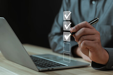 Businessman showing check mark summarizing job Compile lists, votes, and to-do lists. Checklists,...