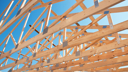 Timber framing, wooden structural framework. Wooden framework during house roofing construction.