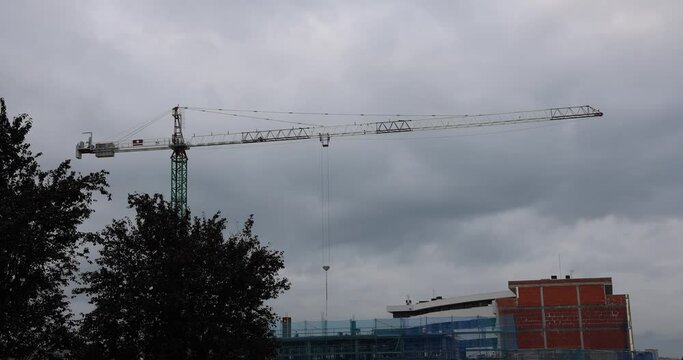 Construction site with moving crane