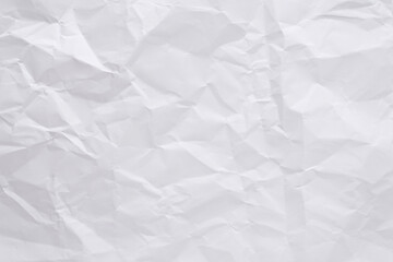 White crumpled paper texture background, clean white wrinkled paper, top view.