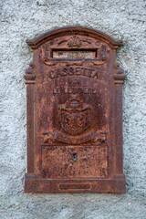 old mailbox on a wall in Italy