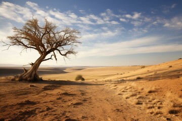 A lone, aging tree in a dry landscape. Generative AI