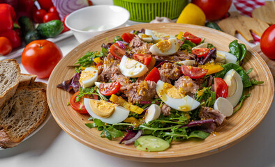 Appetizing fresh salad with canned tuna and vegetables.