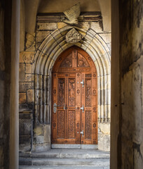 Old door on St. Vitus Cathedral at Prague, Czech Republic