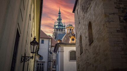 The street near Prague Castle and the tower of St. Vitus Cathedral, Prague, Czech Republic