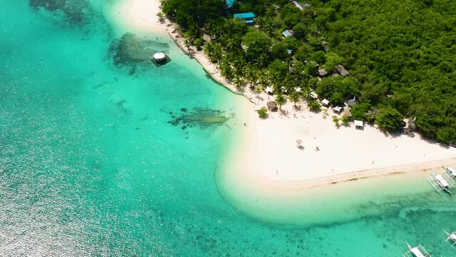 Top view of beach on tropical island and blue sea. Virgin Island, Philippines.