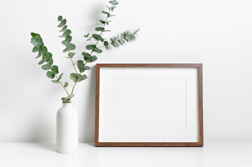 Blank wooden picture frame mockup with copy space for artwork, photo or print presentation