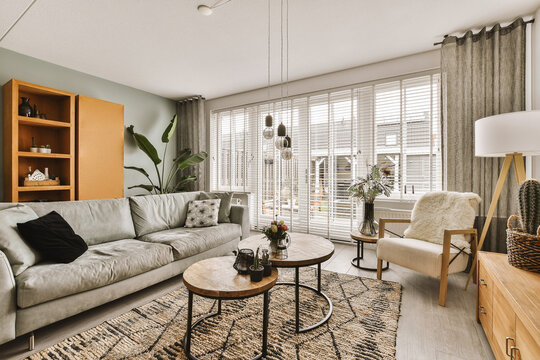 Modern living room with furniture and large window