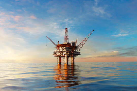 Offshore platform or oil rig in the open ocean producing natural gas for energy.