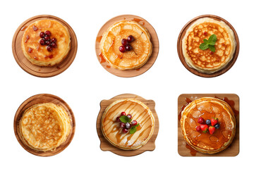 Collection of top view tasty pancakes on wooden board isolated on transparent background, cut out - obrazy, fototapety, plakaty
