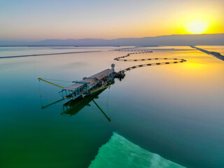 Drone photo of the Dead Sea, Israel, salty coast, Hotels and Spa centers in Ein Bokek area....