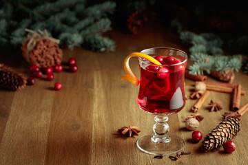 Hot Christmas drink with ingredients.