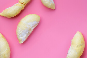 Durian on pink background. Top view