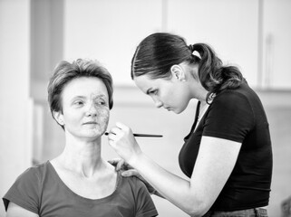 Young woman working as a stylist