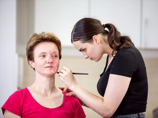Young woman working as a stylist