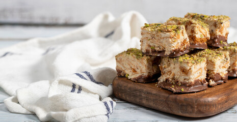 Pistachio and chocolate chip cookies. Fresh pistachio cookies on wooden background