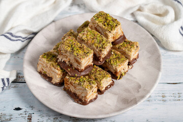 Pistachio and chocolate chip cookies. Fresh pistachio cookies on wooden background