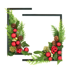 Christmas background flora frame with red decorations, holly, mistletoe, ivy winter greenery on white. Festive abstract card, Noel, New Year holiday design.