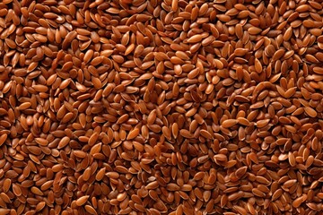 Top view of high quality photo depicting the background and texture of flax seeds also known as flaxseed or linseed commonly used in cereals and considered