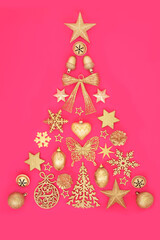 Christmas tree abstract with gold sparkling bauble decorations. Surreal festive concept symbol for holiday season, greeting card, gift tag, label on pink.