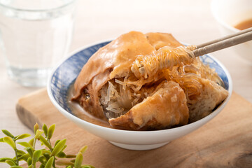 Tamsui agei, delicious famous street food in Taiwan stuffed with mung bean noodles.