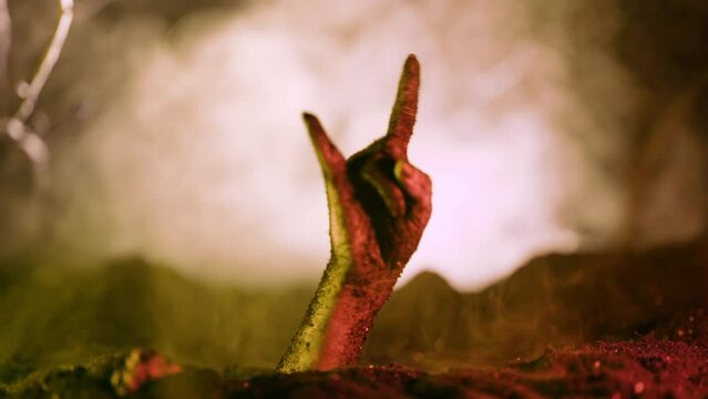 Zombie Hand with rock fingers. Rock'n'roll gesture, punk sign. Halloween party