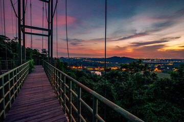 The background of the sea by the evening sea, with natural beauty (sea water, rocks, sky) and fishermen are fishing by the river bank, is a pleasure during travel.