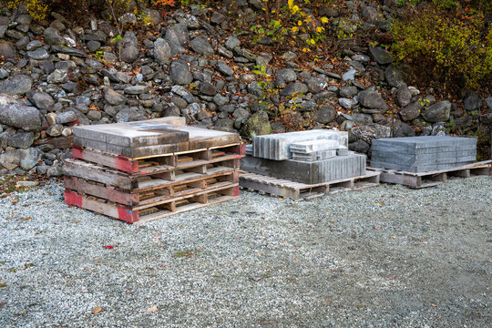 Piles of paver bricks for a patio