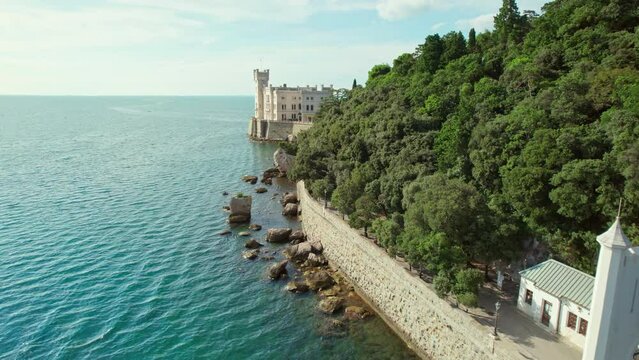 Beautiful aerial view of the Miramare Castle at the Adriatic sea coast in Italy