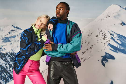 Attractive Couple In Stylish Bold Clothing Posing Together With Head On Shoulder, Winter Concept