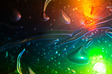 Colorful abstract image of bubble wrap with the bubble and scratch marks under colored light