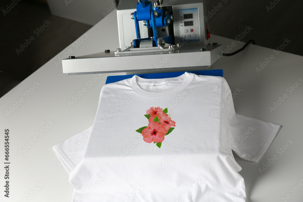 Wall mural Custom t-shirt. Using heat press to print image of beautiful hibiscus flowers