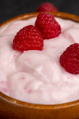 fresh yogurt with raspberry flavor, close up